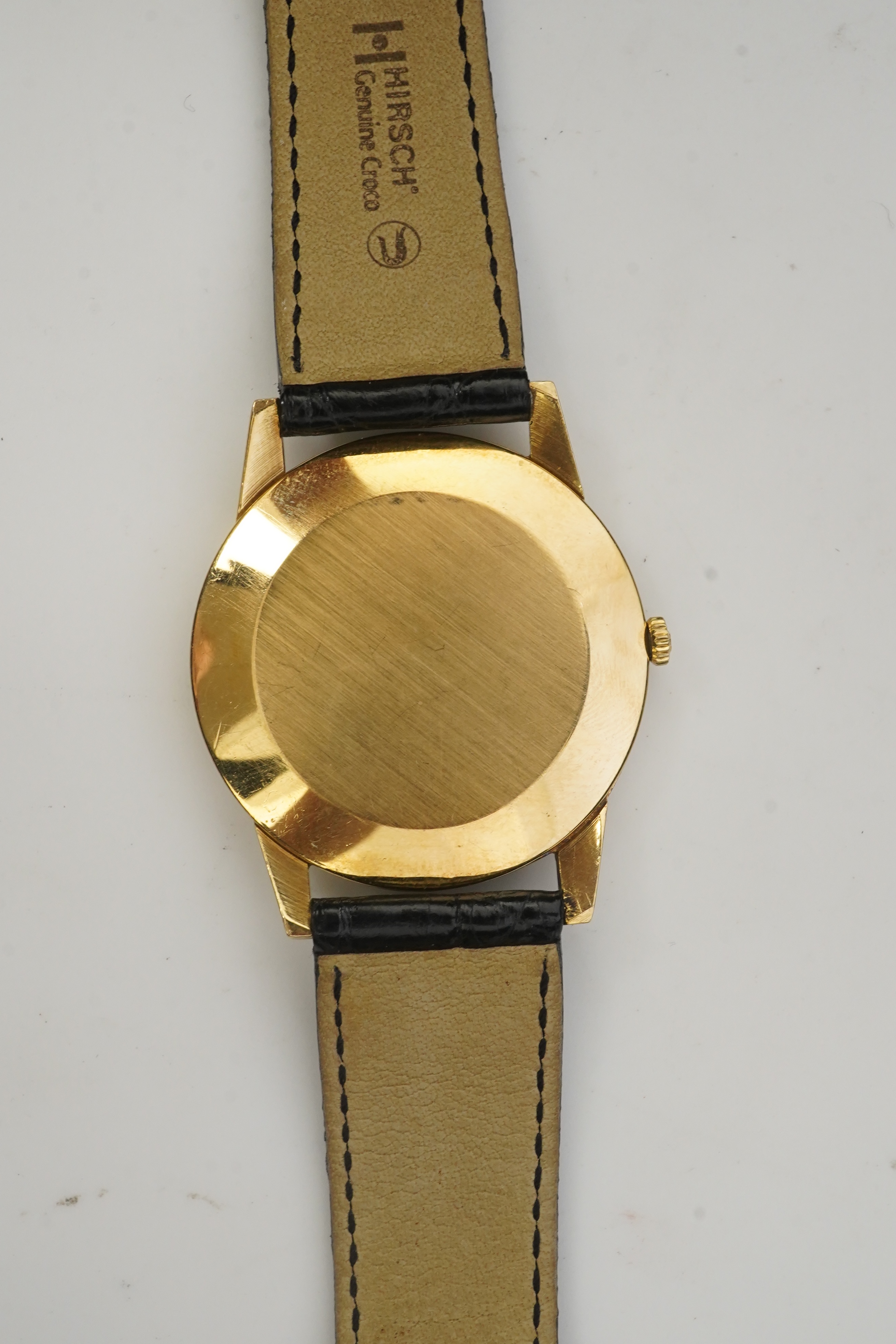 A gentleman's 18ct gold Jaeger LeCoultre manual wind dress wrist watch, on a later associated leather strap